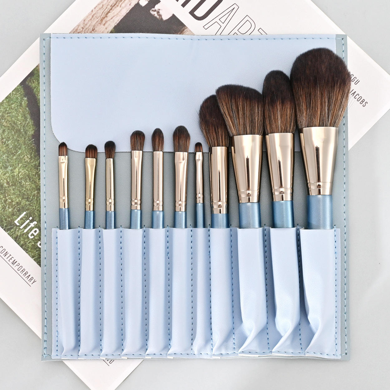 11 lily of the valley flowers with blue rolls