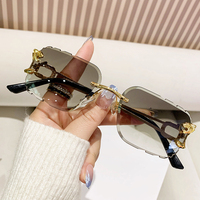 Lunettes de soleil sans monture en métal à coupe diamant UV400, motif léopard, branches irrégulières évidées, lunettes métalliques