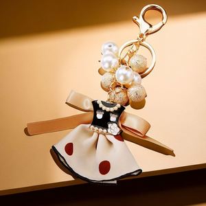 Factory Wholesale Supply Elegant Camellia Pearl Metal Cute Keychain for Women's Girls Bag Pendant and <b>Small</b> <b>Gift</b> - Product Image 4