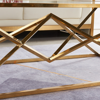Ensemble de table basse et de tables d'appoint 1+4 en verre trempé et métal doré au design moderne et luxueux pour la maison, la villa, l'appartement, le salon, le hall d'hôtel