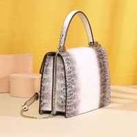 Haute qualité concepteur exotique véritable peau de serpent sac à main femmes personnalisé en cuir véritable bouton Portable unique sac à bandoulière
