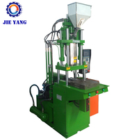 Monture de lunettes Machine de fabrication de pieds de lunettes Machine de moulage par injection verticale pour verres en plastique
