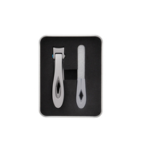 Vente en gros d'un ensemble de coupe-ongles en acier inoxydable 3 en 1 avec lame courbée et loupe pour les ongles des doigts