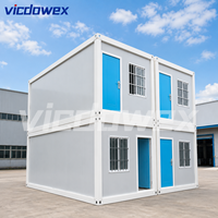 VICDOWEX Maison Conteneur Modulaire Contemporaine Préfabriquée pour Bureaux, Entrepôts, Dortoirs et Camps