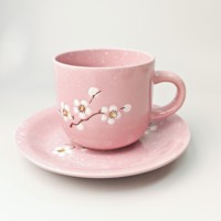 Penjualan laris cangkir kopi warna-warni populer pola berbentuk salju lapisan warna bunga desain khusus set cangkir dan piring keramik