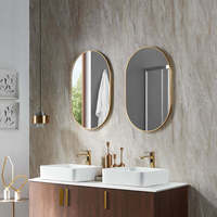 Miroir de salle de bain ovale LED contemporain 80x50cm, miroir argenté 4mm, cadre en laiton brossé/acier inoxydable noir, fixation murale tactile