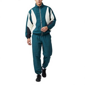 Ensemble de survêtement sportif pour homme, couleur turquoise, respirant, en polyester, veste et pantalon, col montant, coupe-vent, pour le printemps - Product Image 1