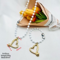 Ensemble collier et bracelet HC en acier inoxydable avec pendentif cœur ajouré, fermoir épingle de sûreté bicolore, bijoux de mode pour femmes, vente en gros