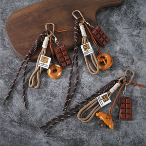 Nouveau porte-clés pendentif pain mignon Miu, eau alcaline, pour étudiants et couples, décoration de sac à dos en PVC, style automne-hiver - Product Image 1