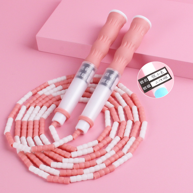 เชือกกระโดดด้ามจับไม้ไผ่สีชมพูอันเป็นเอกลักษณ์