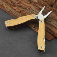 Pince multifonction pliable portable pour le camping, outil de survie multifonctionnel pour les voyages et la randonnée