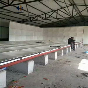 Un réservoir d'eau en panneaux <span class=keywords><strong>de</strong></span> fibre <span class=keywords><strong>de</strong></span> verre <span class=keywords><strong>de</strong></span> 50 000 litres est installé pour <span class=keywords><strong>la</strong></span> ferme, utilisant une conception <span class=keywords><strong>de</strong></span> réservoir d'eau segmenté. - Product Image 1