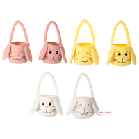 Vente en gros Paniers de Pâques en peluche mignons avec de longues oreilles de lapin Stockage de bonbons de poche pour les oeufs de Pâques Vente à chaud