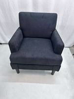 Fauteuil rembourré à dossier haut