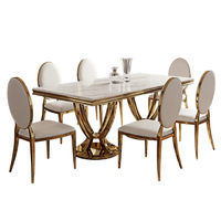 Table à manger en marbre de luxe léger, fabrication directe d'usine de Foshan, structure en acier plaqué or, design rectangulaire, usage domestique, 4 places