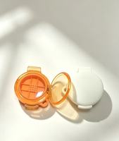 Vente en gros de boîtes à fards à paupières rondes portables minimalistes personnalisées, petites, monochromes, avec clip, emballage cosmétique