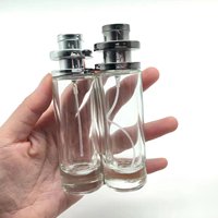Vente en gros de flacons de parfum en verre de 30 ml avec couvercle rond en plastique UV coloré et pulvérisateur à pompe, vides et rechargeables
