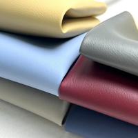Tissu PVC élastique en gros avec support tricoté et motif gaufré pour revêtement de chaise, sac, voiture, textile de maison, doublure de canapé, vêtement