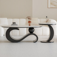 Table basse et table d'appoint noires incurvées en forme de vague, style moderne et minimaliste, pour salon, décoration intérieure, mobilier de centre de pièce.