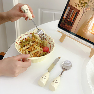 Juego de cubiertos de acero inoxidable con diseño de cara sonriente y mangos de cerámica para uso en hoteles, cocina occidental y filetes. - Product Image 3