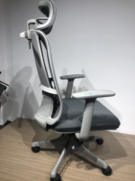 Chaise de bureau noire élégante avec dossier haut Chaise en maille élévatrice ergonomique confortable de nouveau style pour PDG en tissu et PU
