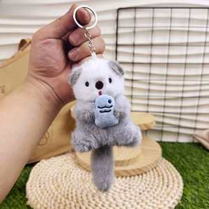 Porte-clés mignon en peluche Otter de mer avec mousqueton - Jouet en coton doux en forme de poisson avec lumière intégrée pour sacs - Product Image 2