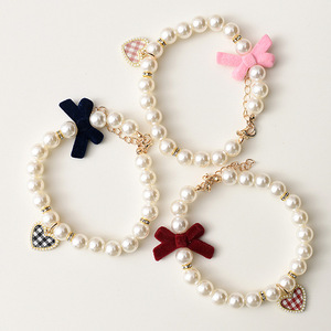 Cute <b>bow</b> cat-specific pearl necklace, pet dog collar, puppy and kitten neck brace decoration - Product Image 1