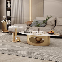 Ensemble de tables basses ovales de luxe moderne avec structure en acier inoxydable et plateau en pierre frittée pour salon et villa