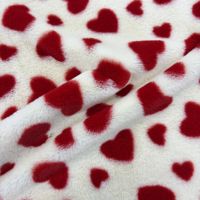 Tissu en fourrure de lapin doux et confortable à motif cœur imprimé, idéal pour couverture de bébé, vêtements, jouets et articles de maison