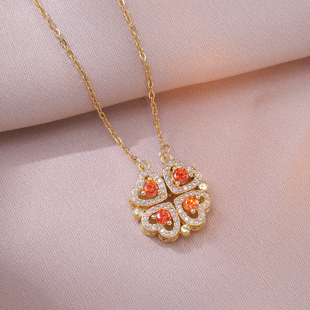 X2706 collar flor cuatro hojas naranja