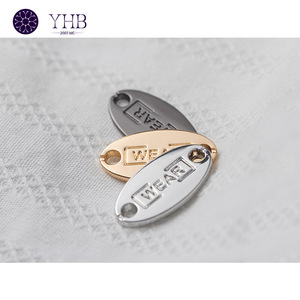 ปุ่มเย็บโลหะป้ายโลโก้อุปกรณ์เสริมสำหรับเสื้อผ้ามี2รูทรงวงรี - Product Image 3