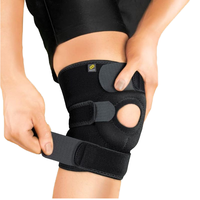 Attelle de genou ouverte avec support en caoutchouc alvéolé, stabilisateur réglable à trois sangles pour luxation et subluxation rotuliennes