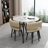Meubles de salle à manger modernes, table ronde avec structure en fer et chaises, plateau en marbre, pour petit appartement