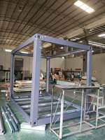 Mini conteneur d'entrepôt à structure en acier préfabriquée de 20 pieds et 10 pieds pour le stockage extérieur ou l'atelier en emballage plat avec panneau sandwich