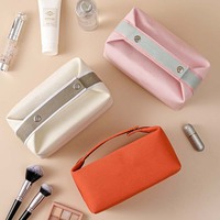 Pochette de maquillage en toile imperméable de luxe personnalisée, sac de toilette cosmétique tendance pour femmes, sac de rangement de voyage avec poignée