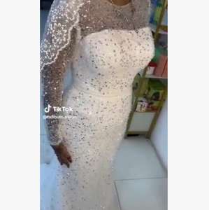 Vestido de novia de sirena de encaje con cuentas de cobertura completa africana de talla grande elegante manga larga Escote de ilusión vestido de novia de cola de pez - Product Image 1