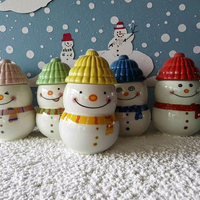 Vente en gros de bocaux à bougies bonhomme de neige en céramique de Noël personnalisés récipient cylindrique pot bol boîte à bougies décorative pour la maison