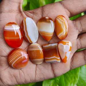 พลอยอาเกตสีส้มธรรมชาติแบบแถบลาย  ขนาด 181 กะรัต จำนวน 8 ชิ้น  ขัดเงาแล้ว  ผ่านการรับรอง  จำหน่ายส่งจากผู้ผลิตในอินเดีย - Product Image 1