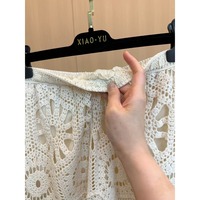 Nouvelle collection été 2026 : Jupe midi en crochet crème pour femme, taille haute, coupe trapèze, dentelle ajourée festonnée, style bohème élégant, faite main, grandes tailles, vente en gros