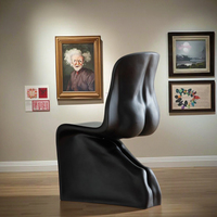 Chaise d'appoint sculpturale monobloc en plastique renforcé de fibres, design moderne, certifiée CE pour une utilisation intérieure et extérieure
