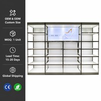 Étagère murale en acier inoxydable avec panneau graphique rétroéclairé pour présentoir de chaussures LED commercial personnalisé pour magasin de mode