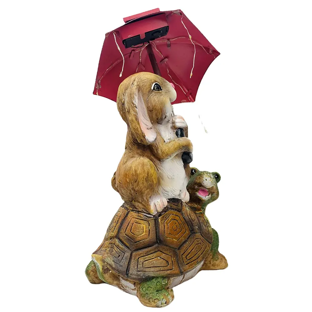 イースターバニーソーラーガーデン像屋外装飾、ストリングライトで傘を持ってタートルに座っているウサギ