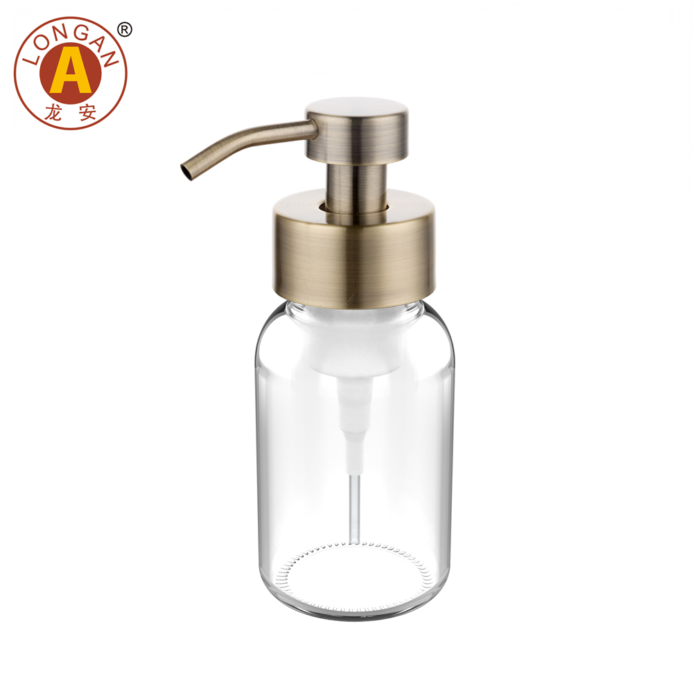 Flacon transparent avec pompe à lotion en bronze