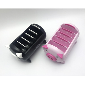 Organizador de escritorio con forma de cerdo con compartimentos para control remoto y soporte para teléfono - Product Image 3
