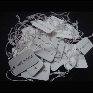 Etiqueta de papel hecha en China de 2.5x1.5 cm, blanca con letras negras para uso en prendas, etiquetas impresas personalizadas - Product Image 1