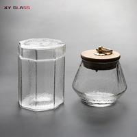 Pot en verre fait main à motif de marteau durable à haute teneur en borosilicate pour le stockage des herbes, du thé et du sucre.