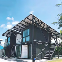 Maisons conteneurs multi-étages dotées d'un système de maison intelligente et de murs en verre pour un espace familial moderne, spacieux et intelligent