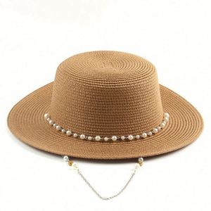 Wholesale Seaside Sunshade Paper Sun Beach <b>Hats</b> <b>Flat</b> Round Top Womens Straw <b>Hats</b> With Pearl Chain - Product Image 1