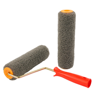 Rouleau à peinture noir en vente chaude avec poignée en plastique rouge, motifs de rouleaux à peinture pour la décoration murale