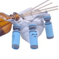 Vente en gros Forme personnalisée Disjoncteur de seringue Coupeur de caoutchouc souple Soins infirmiers Blister Ouvre-ampoule en verre PVC sans danger avec porte-clés